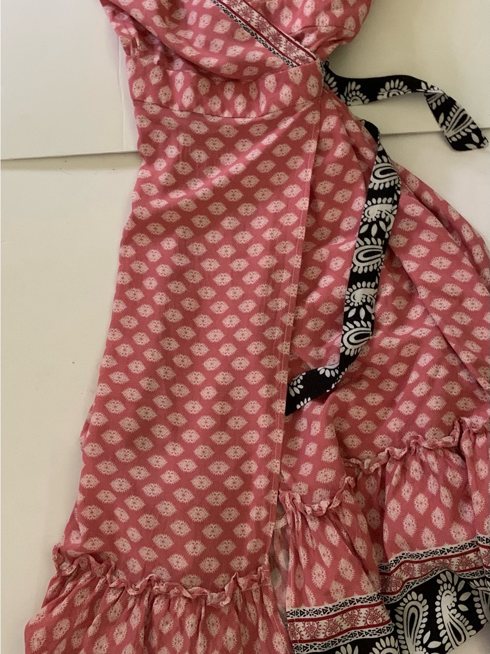 Coral and cream Printed Wrap Dress with Black Patterned Sash and bottom ruffle - Picture 3 of 5